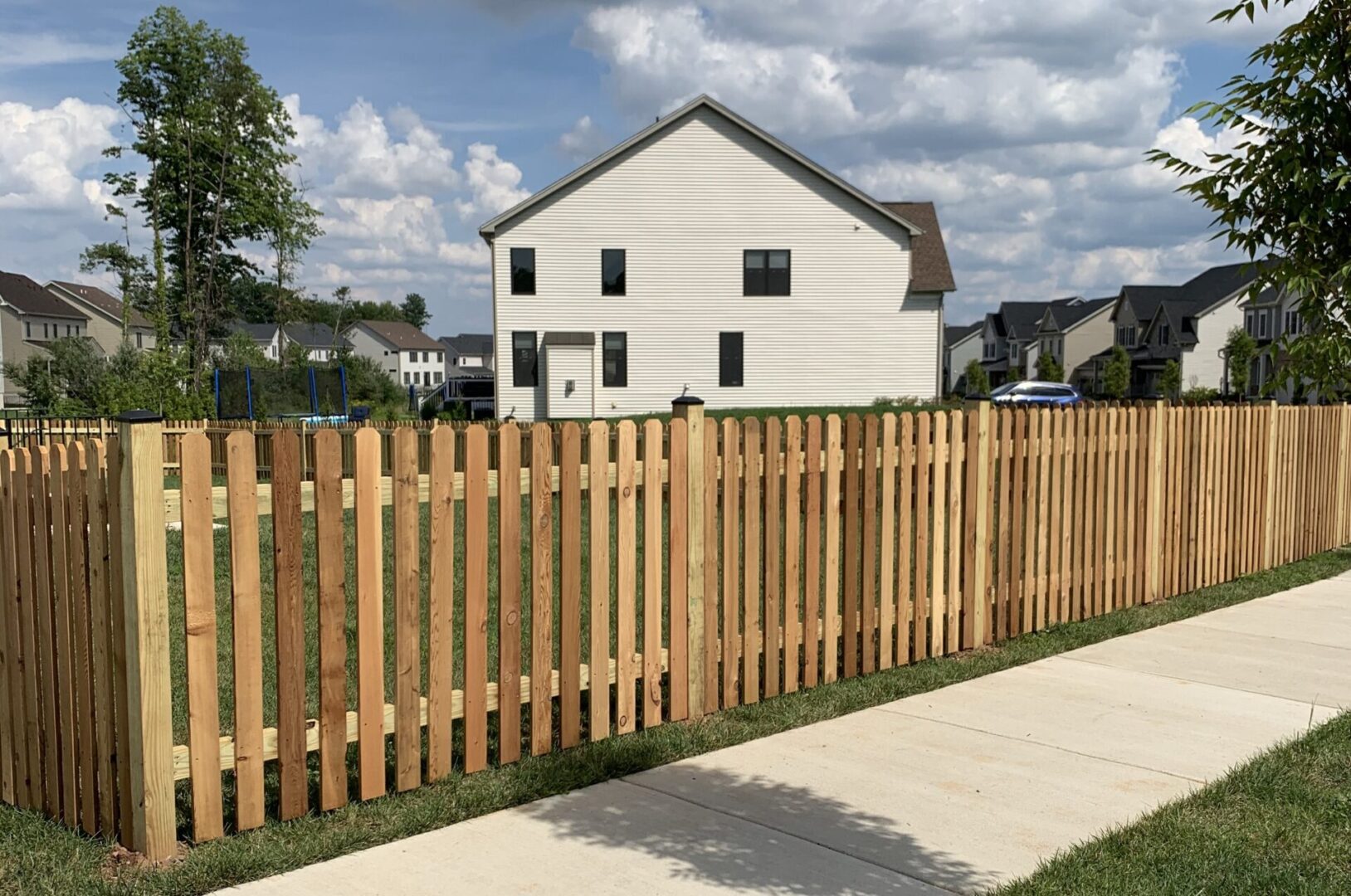 A house with a fence in the background